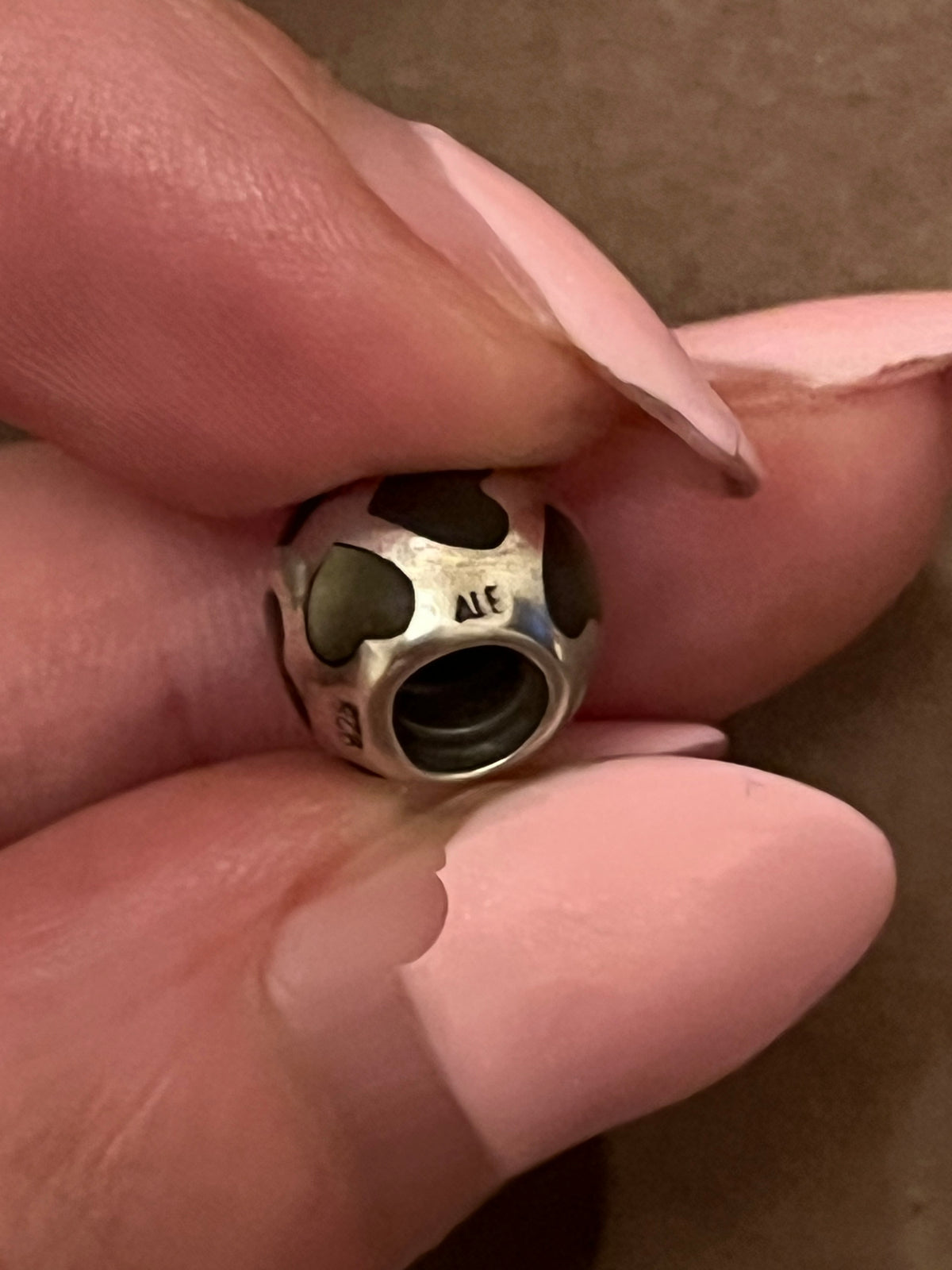 Pandora black pearlescent hearts charm